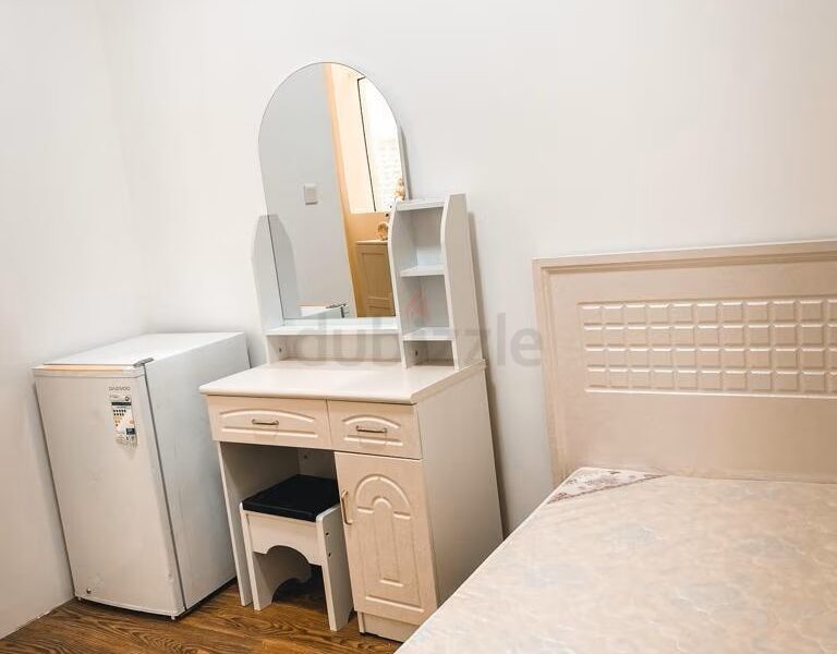 Private partition Room For Single Lady @ 3200Downtown Dubai
